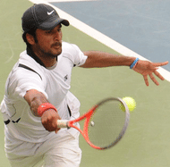Saketh Myneni closes out a volley
